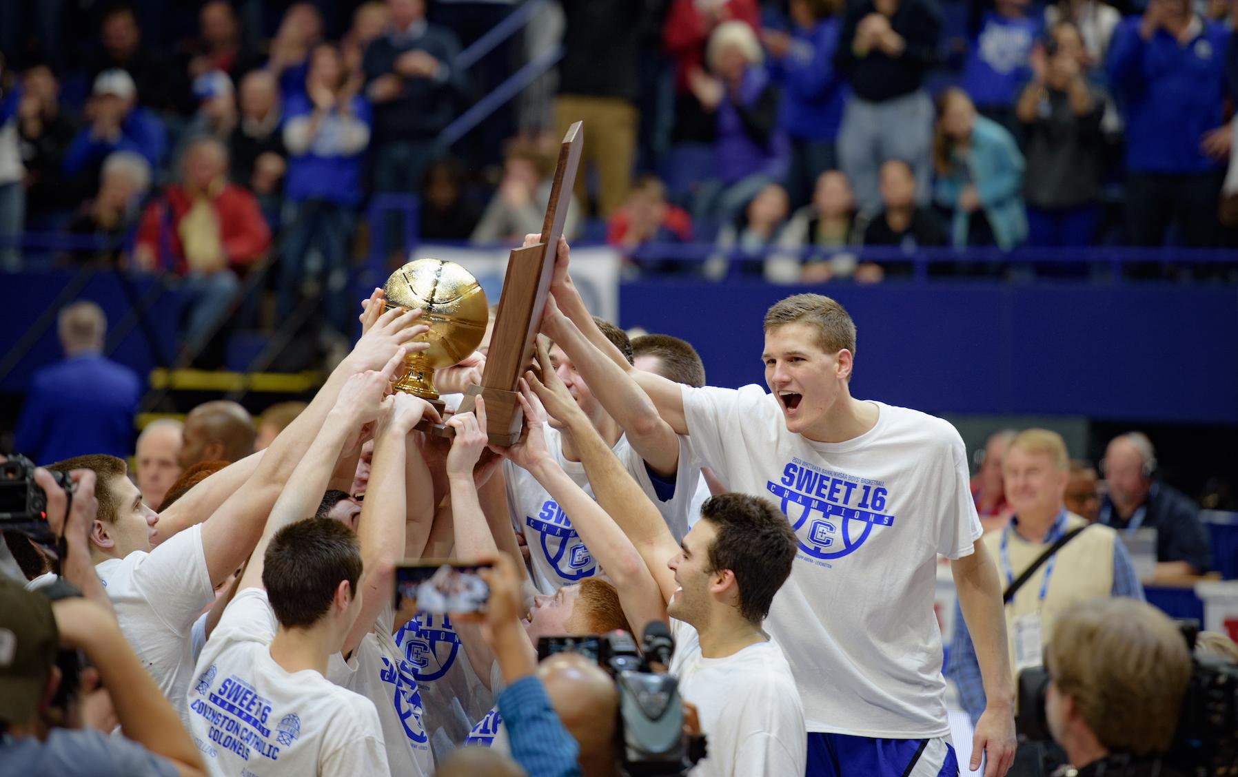 Players wearing championship shirts